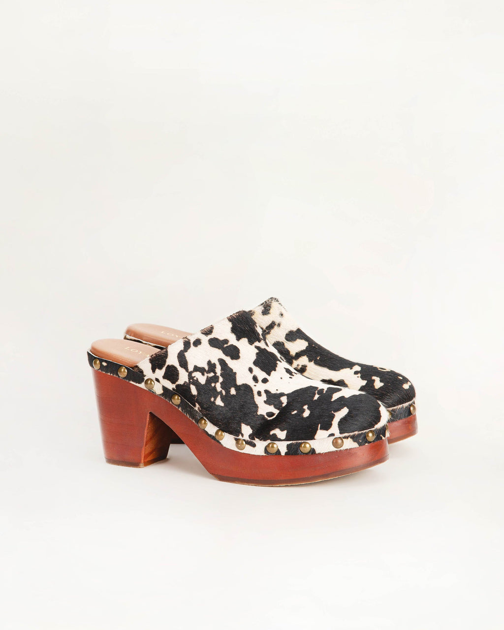 CARLOTTA TRAIL CLOGS BLACK AND WHITE COWHIDE