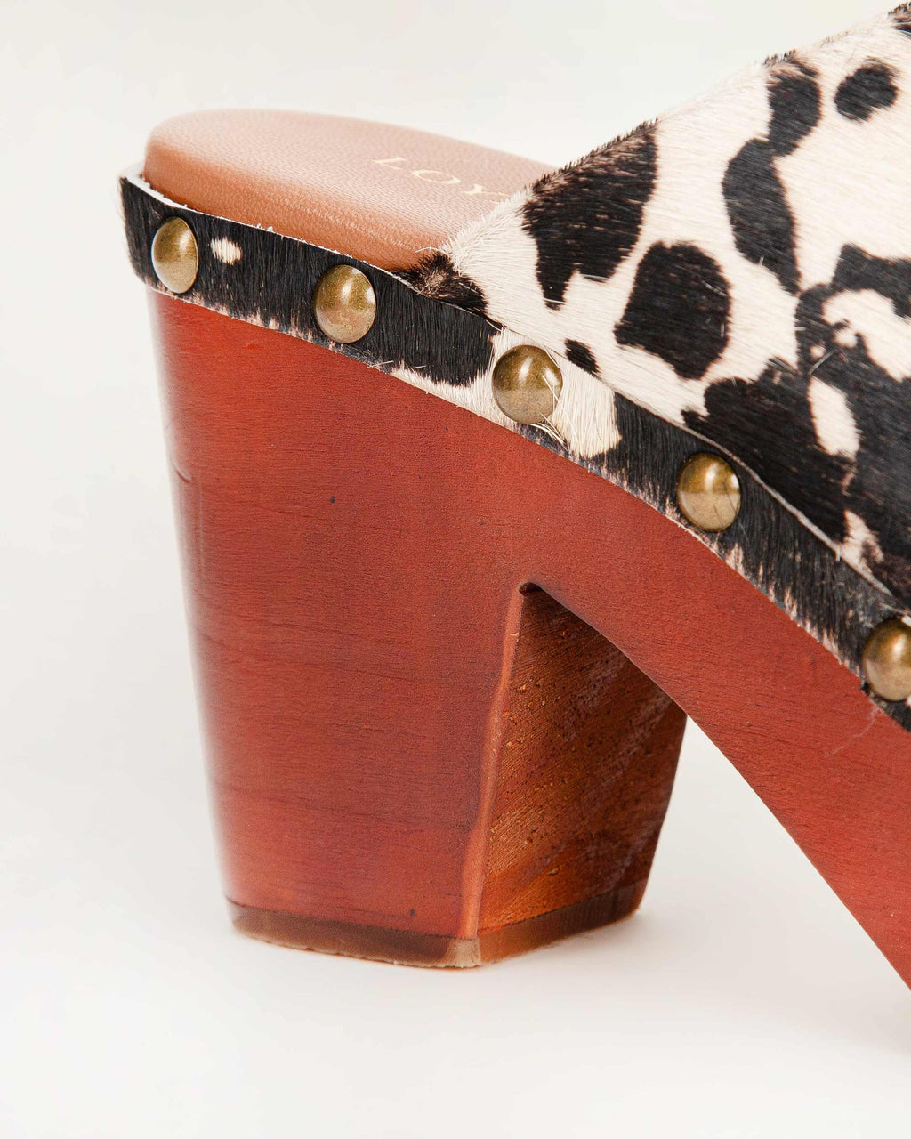 CARLOTTA TRAIL CLOGS BLACK AND WHITE COWHIDE