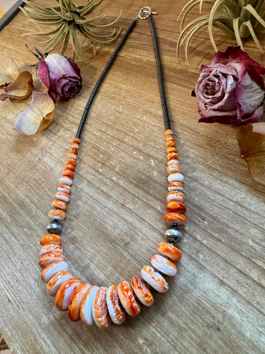 23 inch Graduated Orange Spiny
Necklace with Sterling Silver
Pearls