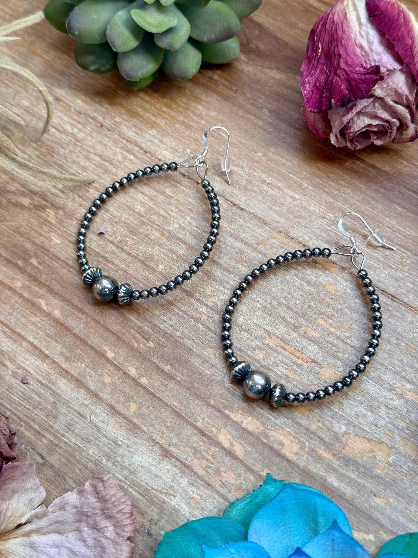 Sterling Silver Pearl Hoop
Earrings - 8 mm in the middle