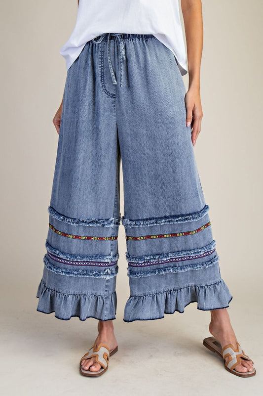 RUFFLE BOTTOM STONE WASHED CHAMBRAY PANTS