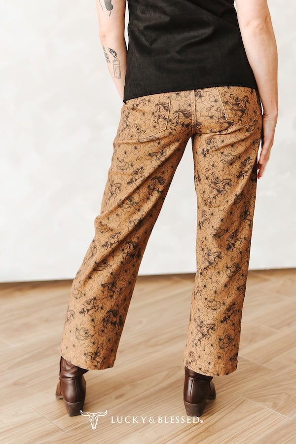 CAMEL FLORAL PRINTED STRETCH DENIM MID RISE BARREL
JEANS (28IN INSEAM)