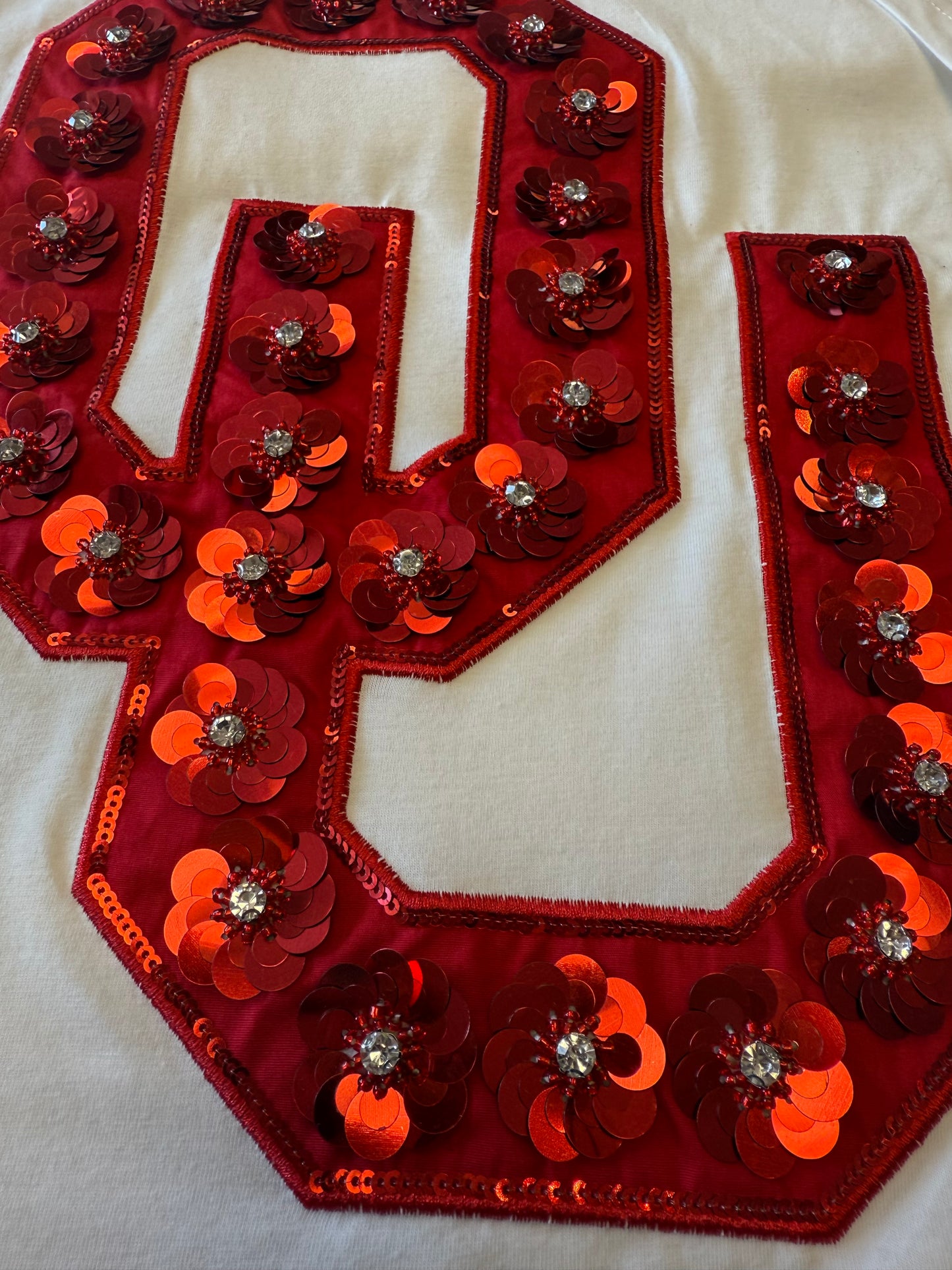 Queen Of Sparkles Licensed Oklahoma Mascot Sequin Flower Tee