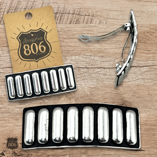 Western style hair clip with raised design