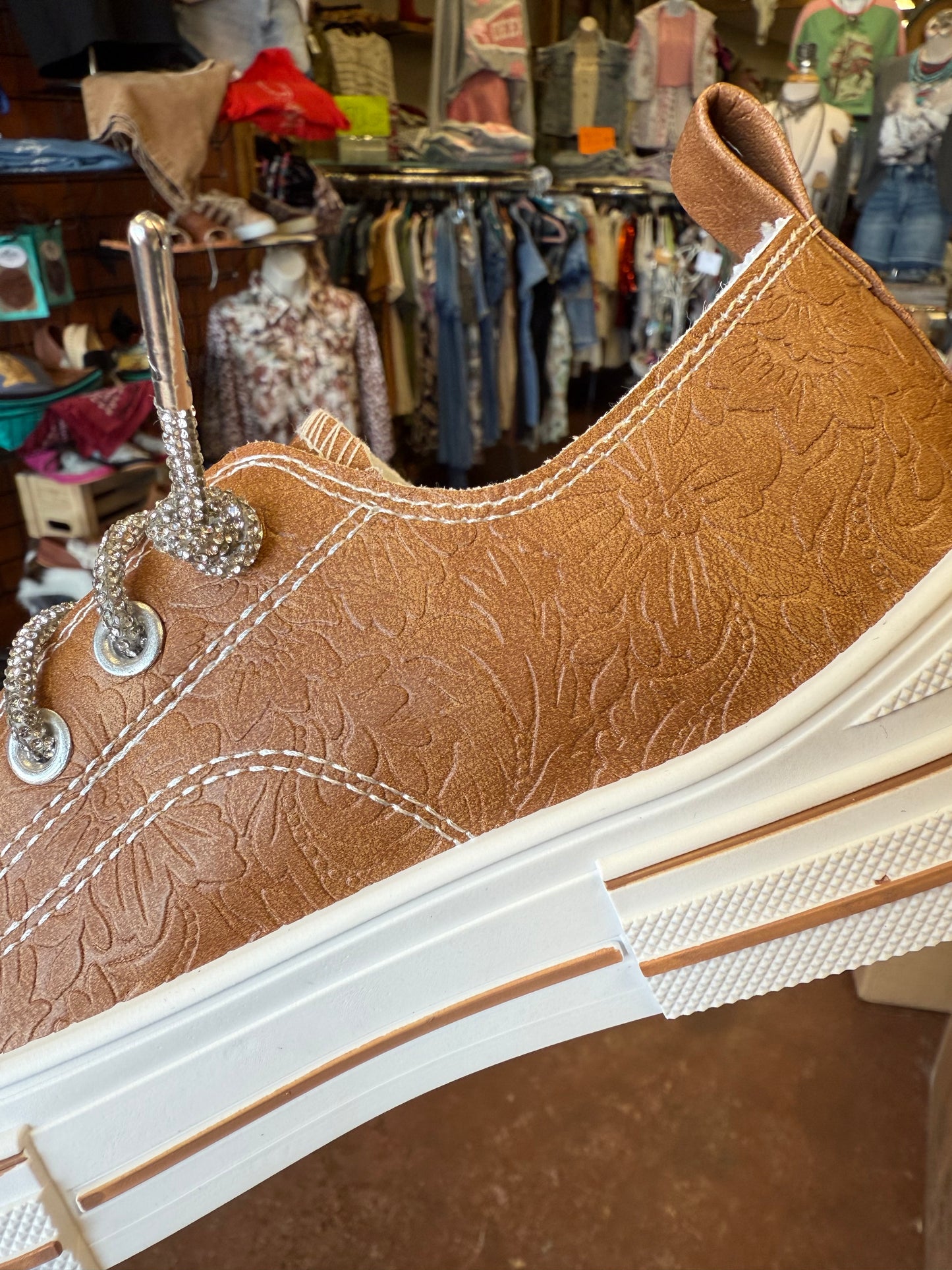 Madeline Tooled Floral
Embossed Slipon Sneaker