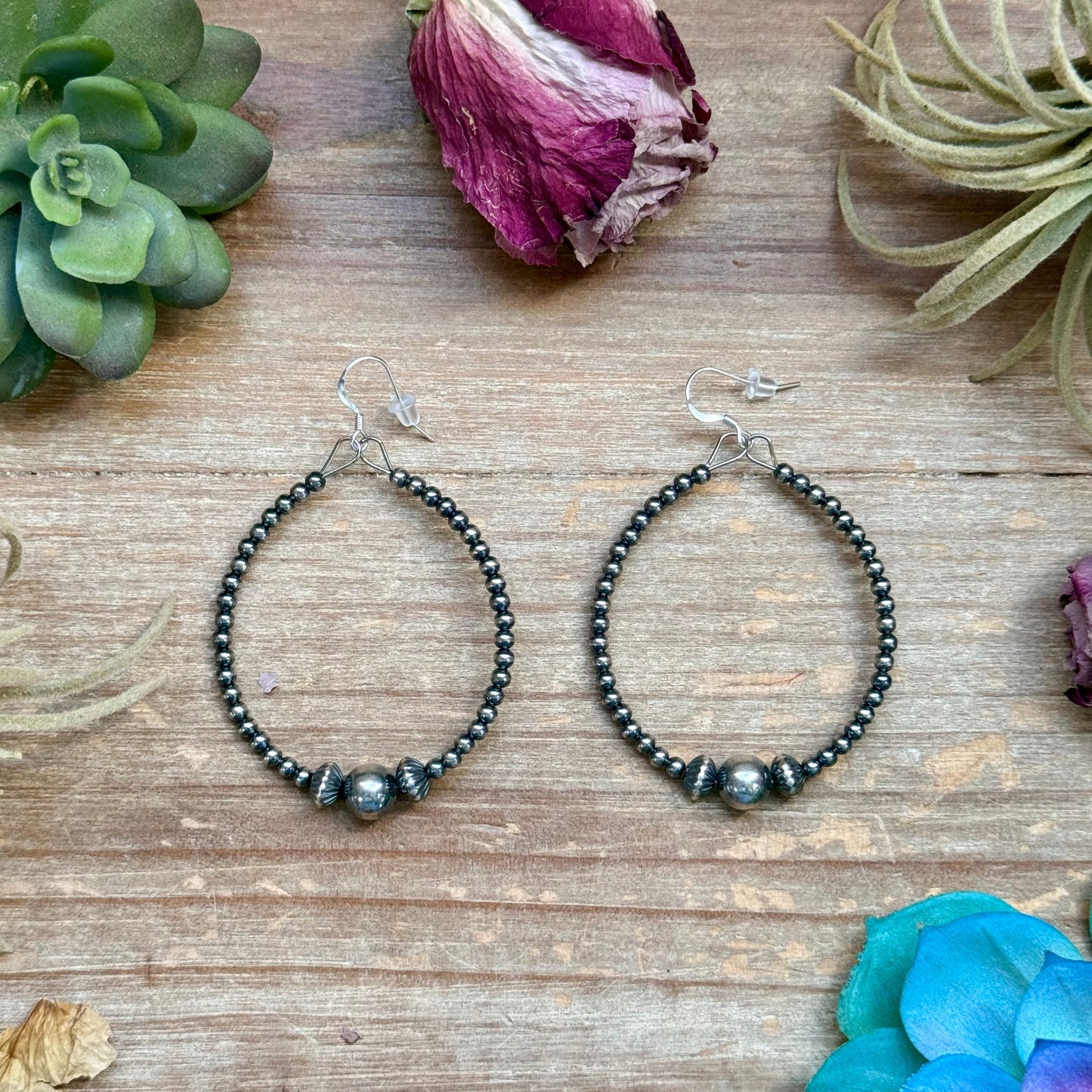 Sterling Silver Pearl Hoop
Earrings - 8 mm in the middle