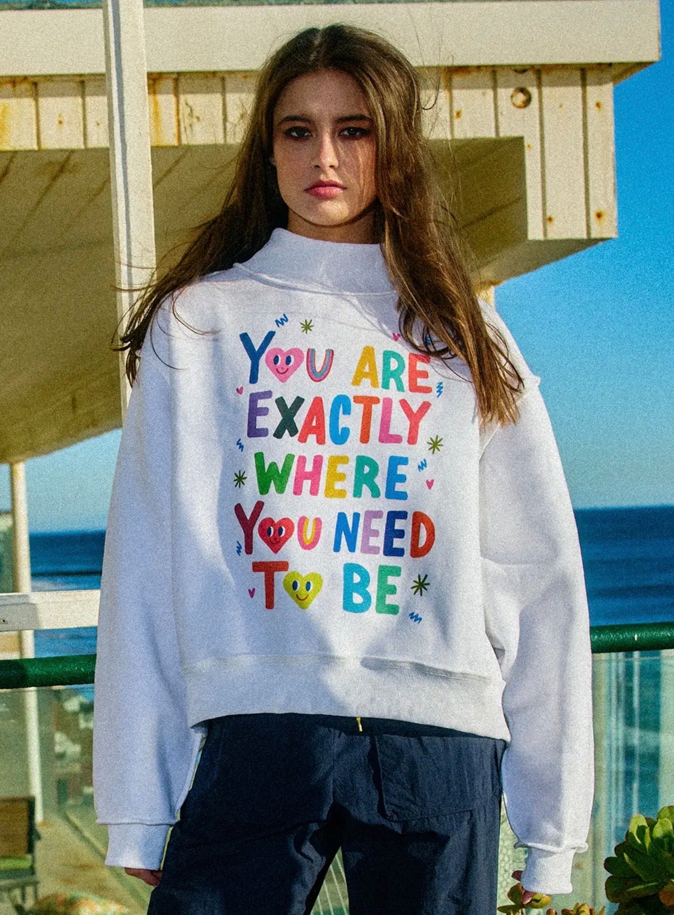 REVERSIBLE GRAPHIC MOCK-NECK CROP SWEATSHIRT